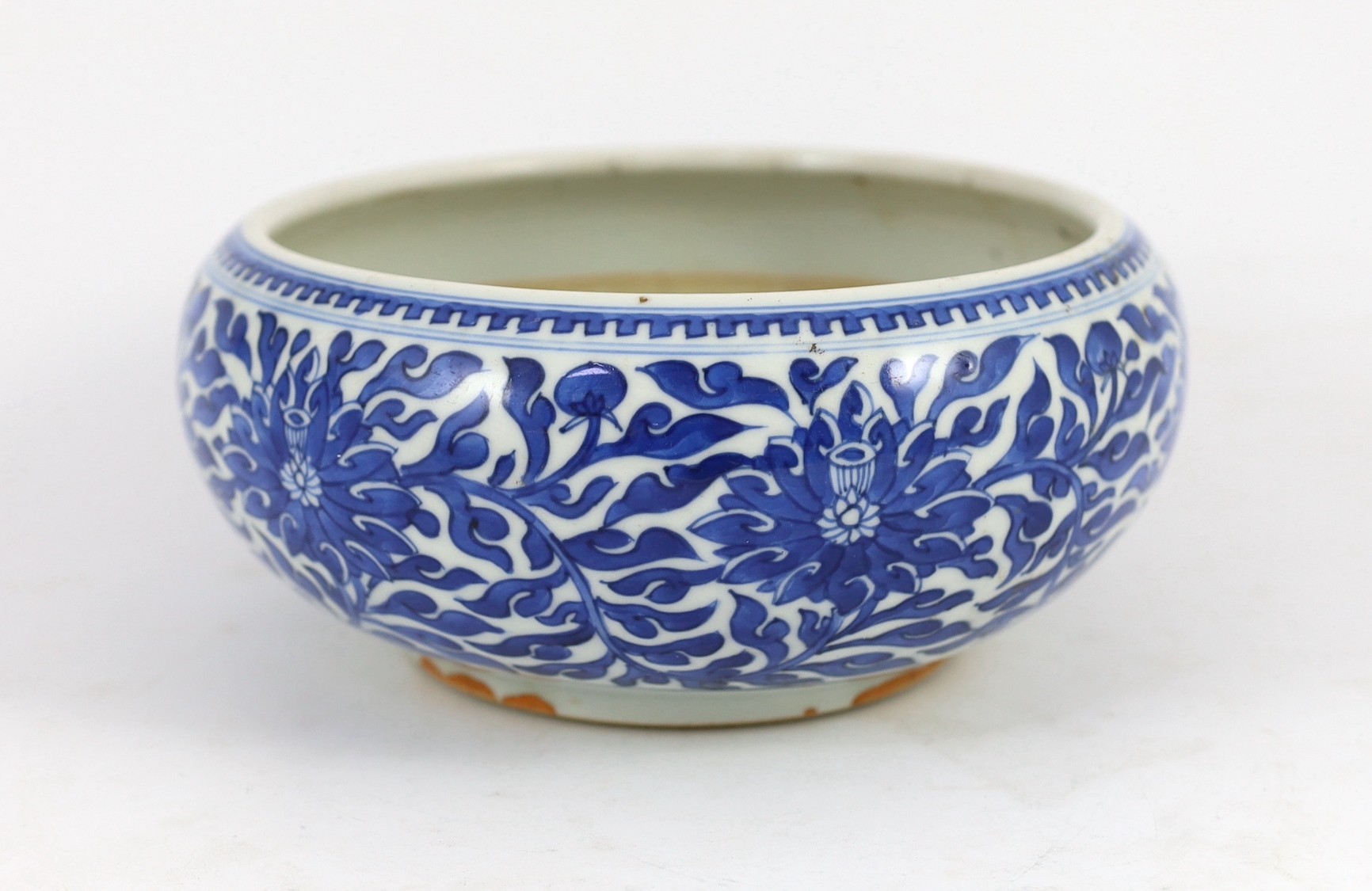 A Chinese blue and white ‘alms’ bowl or censer, cyclical date for the 56th year of the reign of Kangxi corresponding to 1717 and of the period, 21cm diameter 9cm high, two hairline cracks